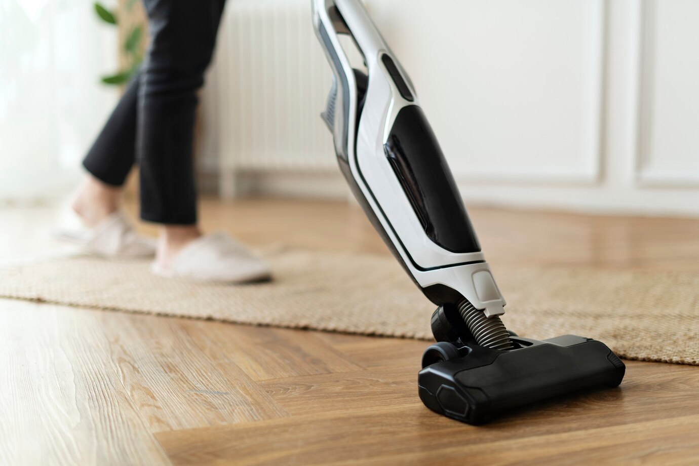 housewife vacuuming parquet floor 53876 127258